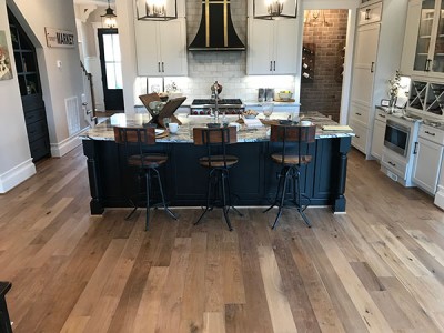 The Beauty of Fumed Hardwood Floors is perfectly displayed in this Novella Twain installation by Howdyshell Flooring. 