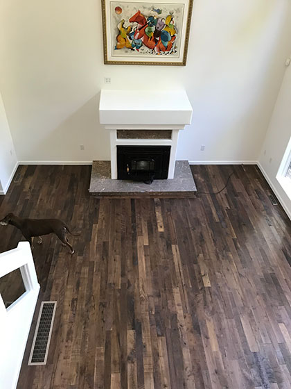 organic solid tamarind living room installation by adams family flooring