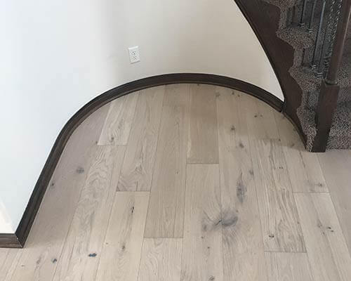 Ventura Seashell Stairway Install Portfolio by Gautsche. Hardwood flooring by Hallmark Floors.