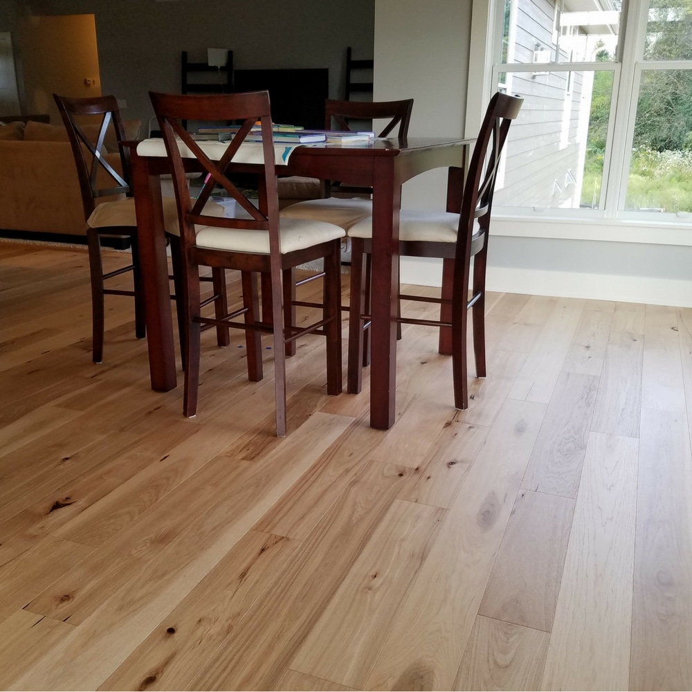 small dining room table with engineered hickory plank flooring