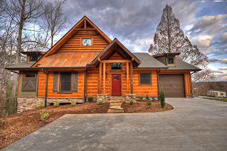 Modern cabin home in the woods of Ellijay Georgia. Dalton Wholesale Floors dealer in East Ellijay. Cabin facade in Ellijay Georgia. They sell beautiful Hallmark Floors' hardwood and waterproof flooring.