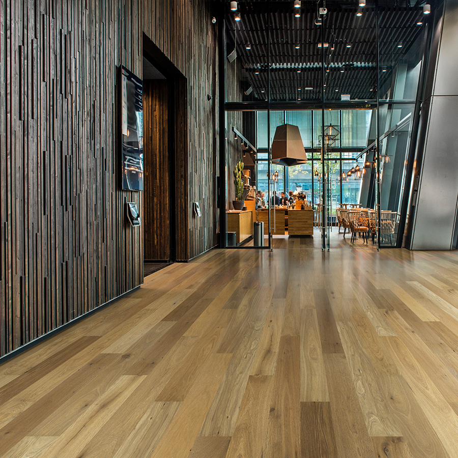 Sandal Oak hardwood flooring installed in a beautiful hotel lobby. Hallmark Commercial flooring.