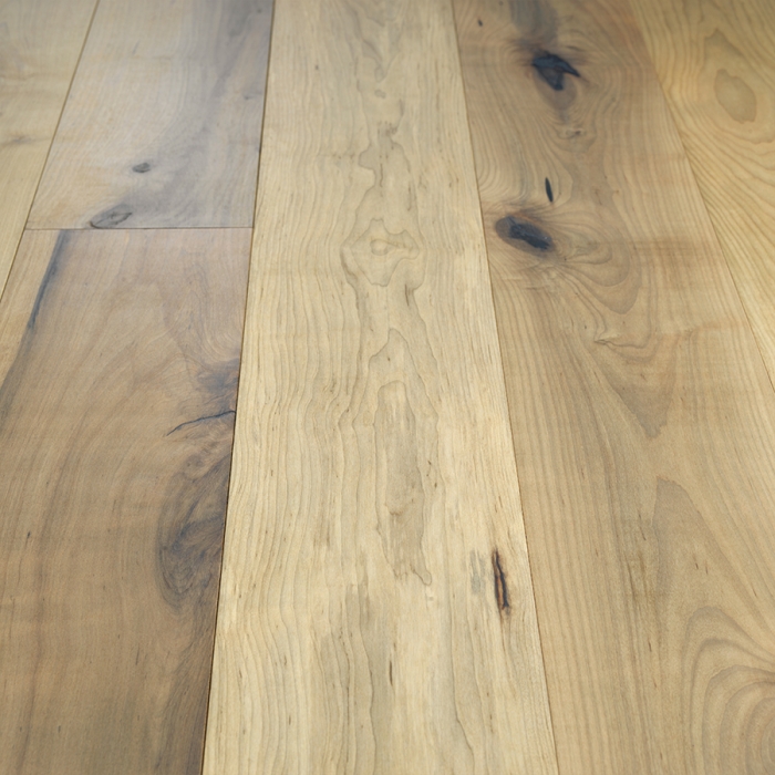 Orris Maple Hardwood Floors from the True Hardwood Flooring Collection by Hallmark Floors. True Hardwood Flooring where the color goes throughout the surface layer without using stains or dyes.