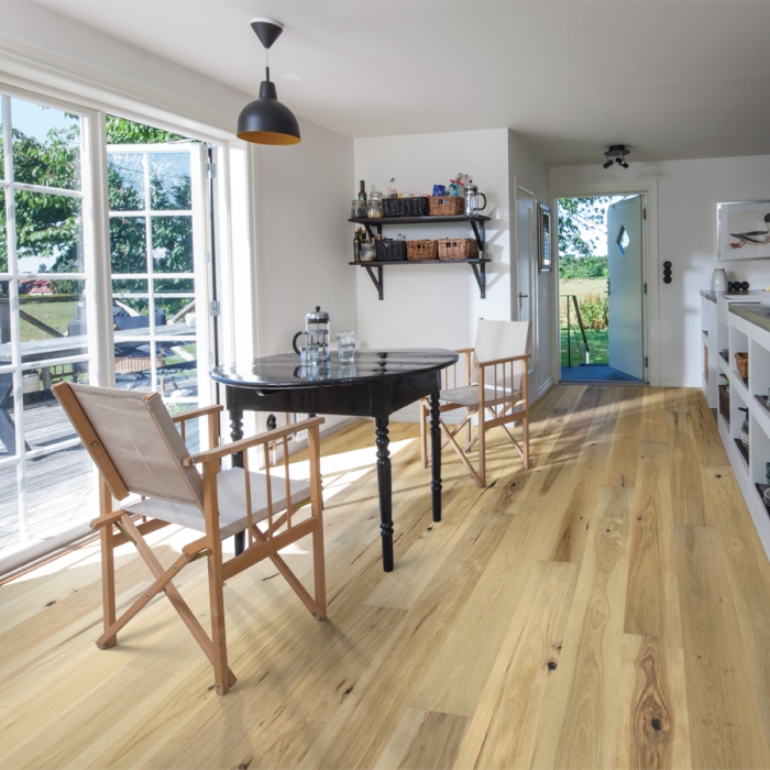 Orange Blossom Hickory hardwood Floors from the True Hardwood Flooring Collection by Hallmark Floors. True Hardwood Flooring where the color goes throughout the surface layer without using stains or dyes.