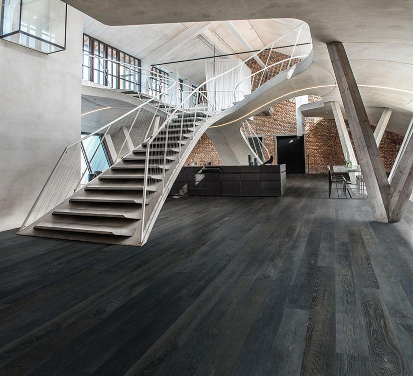 Onyx, Oak, Hardwood Commercial Flooring from the True Hardwood Flooring Collection by Hallmark Floors. True Hardwood flooring where the color goes throughout the surface layer without using stains or dyes.