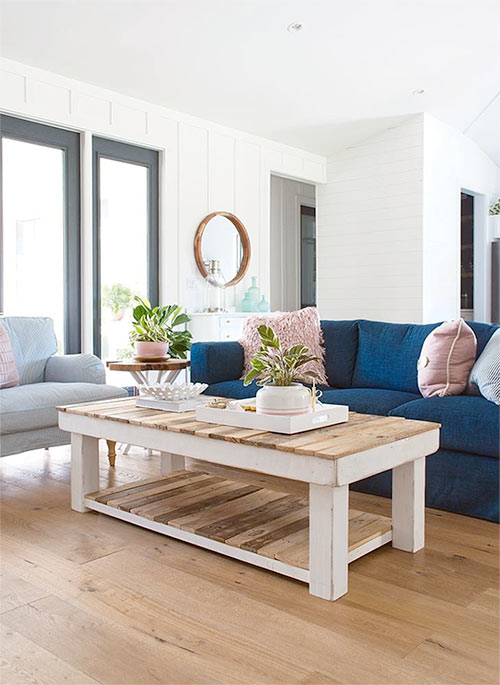 Farmhouse home decor with this beautiful coffee table. Farmhouse Design Inspiration with Michelle Wood and Hallmark Floors. Floors are Alta Vista hardwood flooring. 