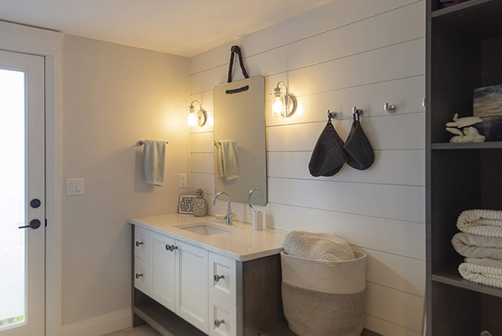 Modern Farmhouse renovation & design in a bathroom ship-lap walls. 